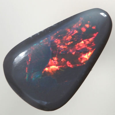SOLID BLACK OPAL Bright cherry red rolling flashes
